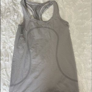 Striped lululemon swiftly tech tank top size 4